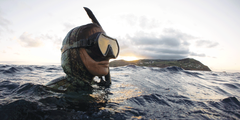 Kimi Werner spearfishing in the RIFFE Frameless Amber mask